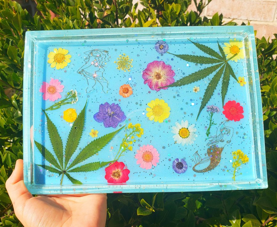 2 XL rolling trays handmade by me using real cannabis leaves and dried flowers